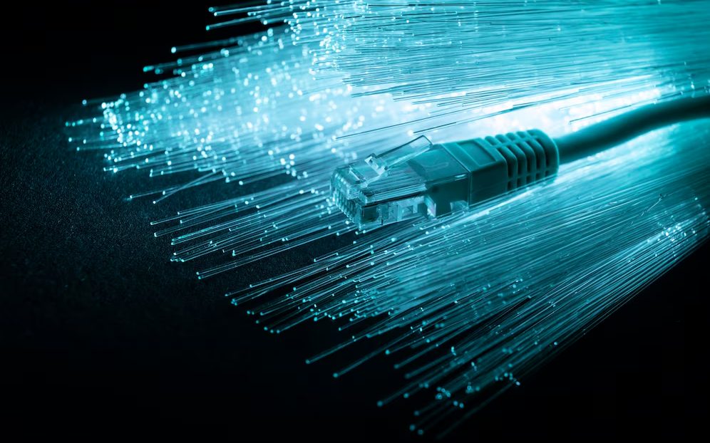 Glowing fibre optic strands with a network cable connector